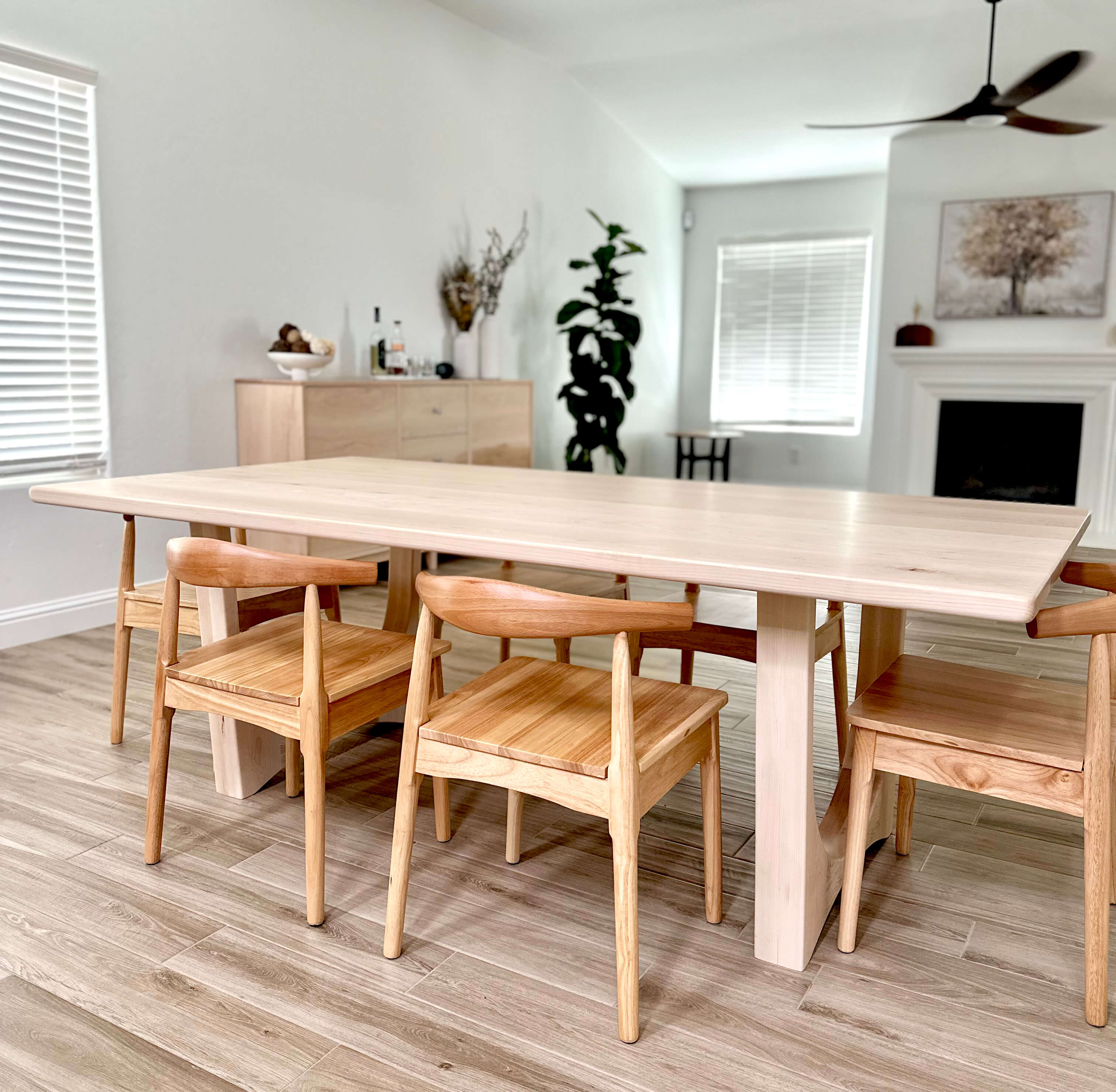 handmade solid maple dining table in dining room with other handmade furniture